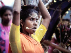 18 Carrying a pail of milk as her burden 800